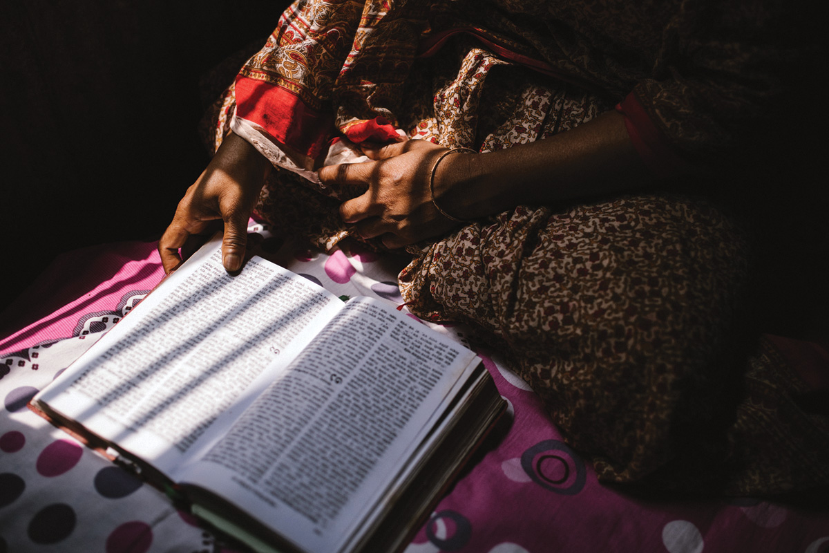 Image A Bangladeshi woman reading her bible